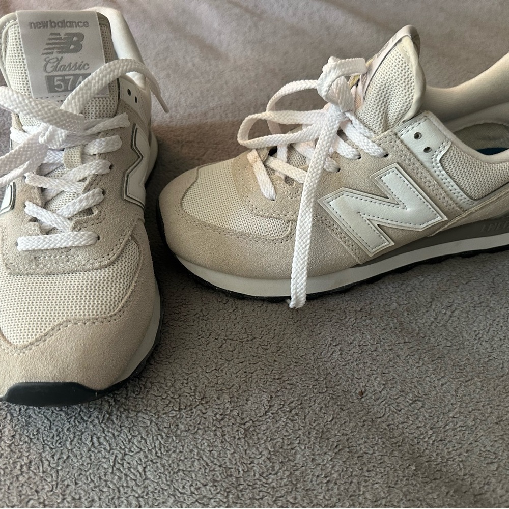 New Balance WL574EVW Sneakers in White and Black